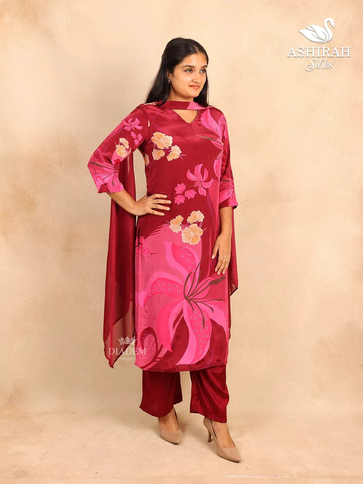 Burgundy Straight Cut Suit in Satin with Floral Prints paired with Dupatta