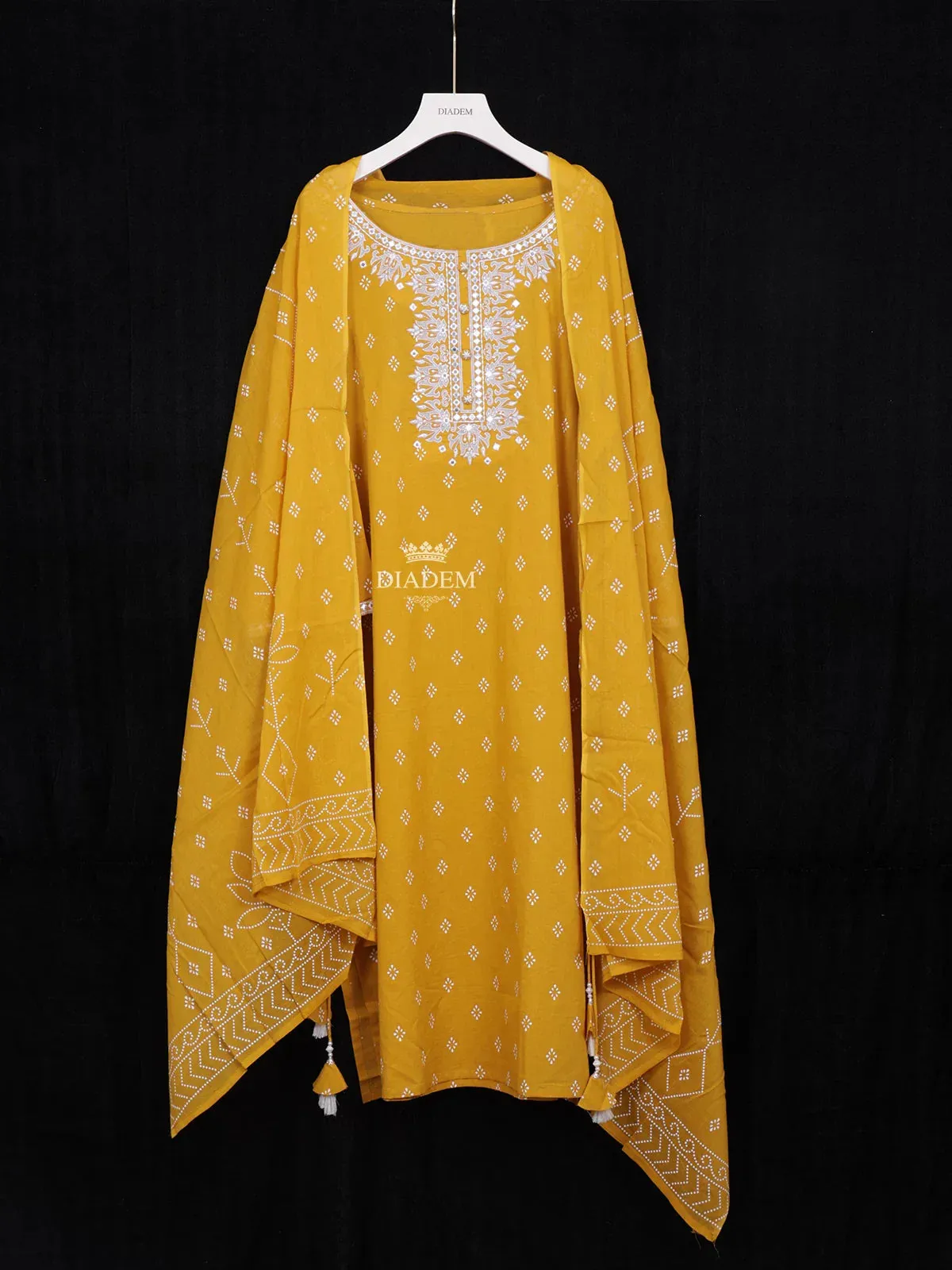 Chrome Yellow Cotton Straight Cut Salwar Suit Adorned with Floral Prints and Mirrorwork Paired with Dupatta