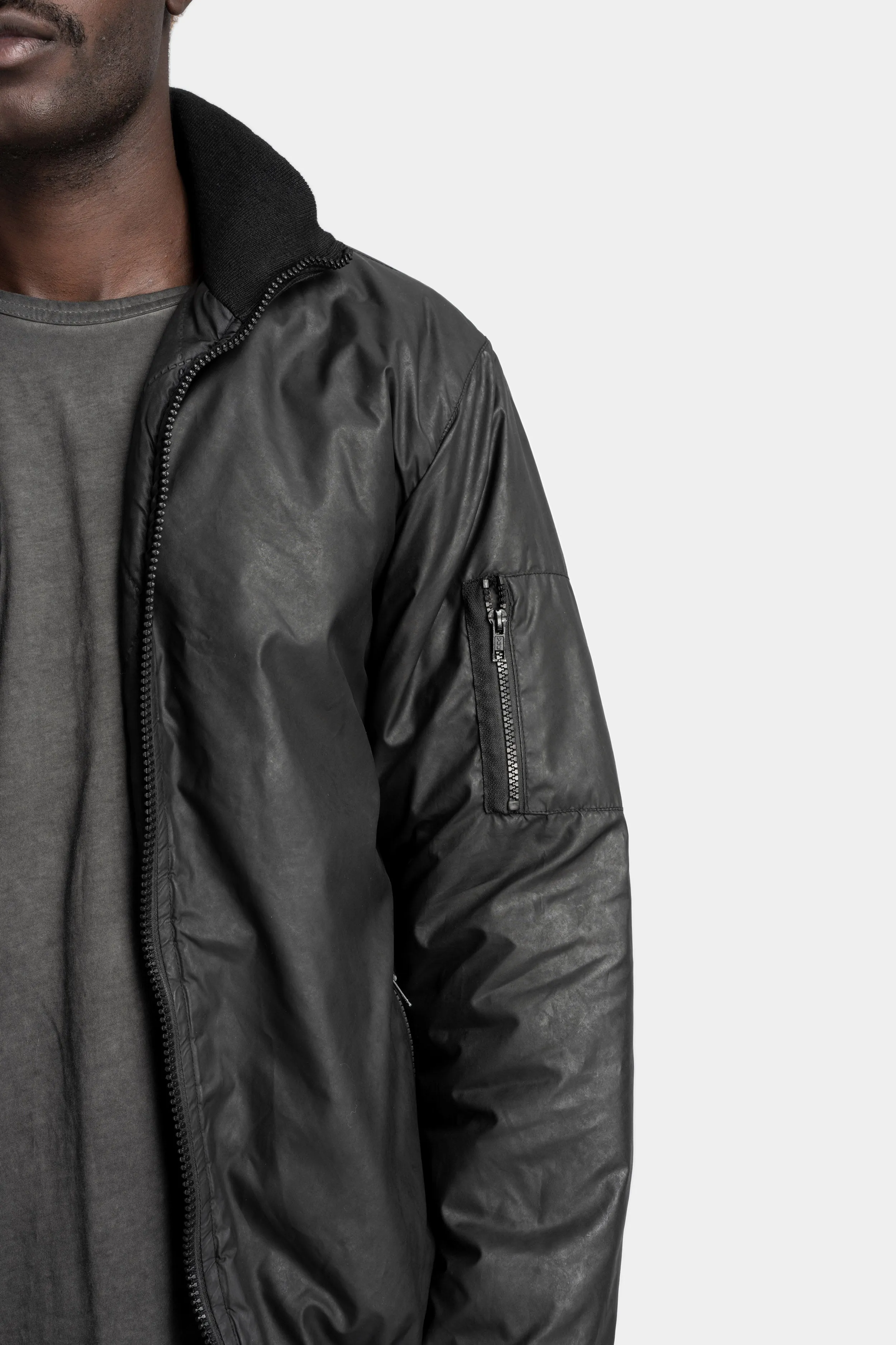 Coated reversible bomber jacket