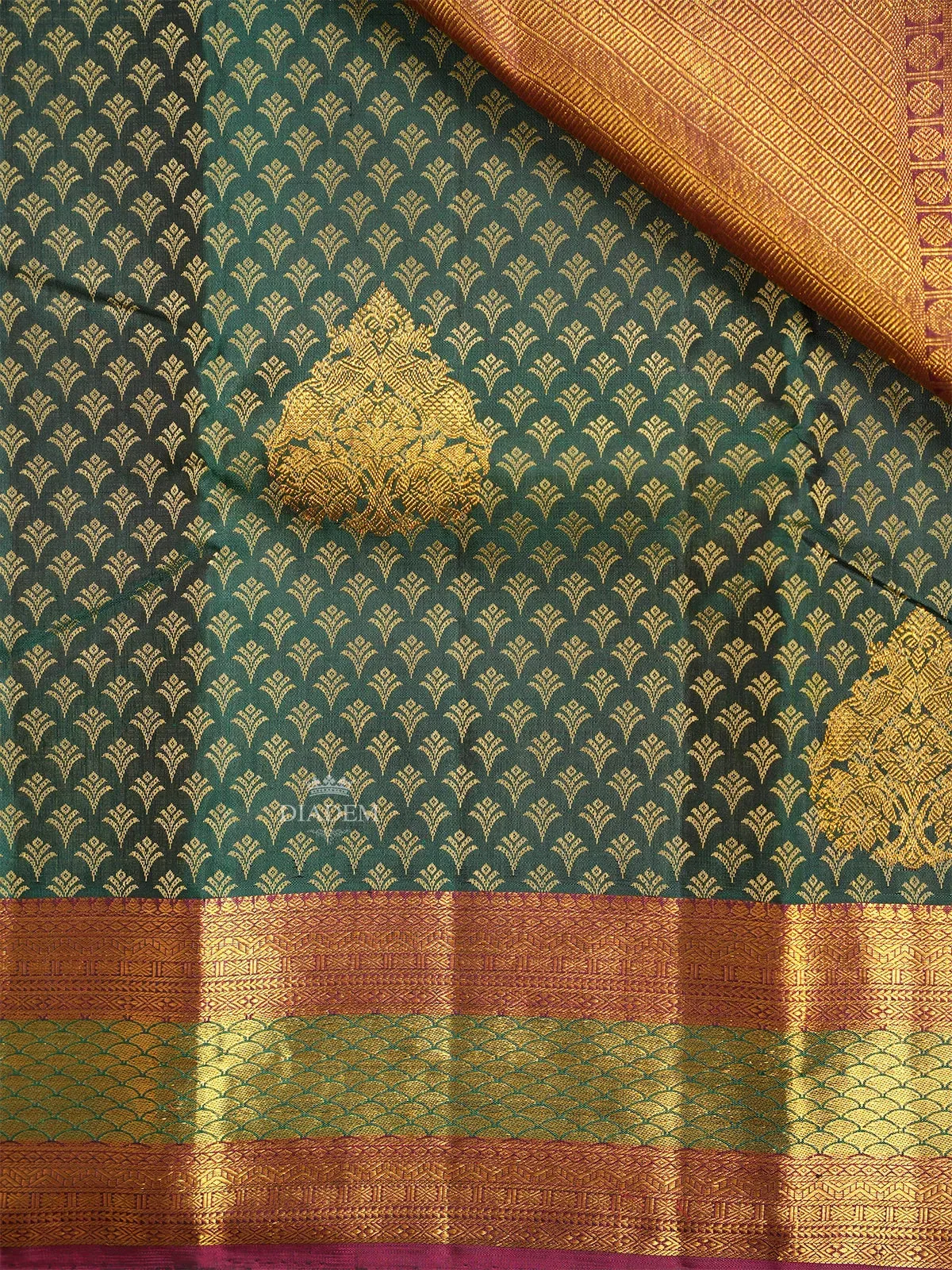 Dark Green Pure Kanchipuram Silk Saree With Peacock and Floral Motifs On the Body with Broad and Small Border