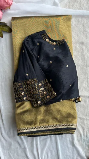 Gold tissue saree with black handwork blouse