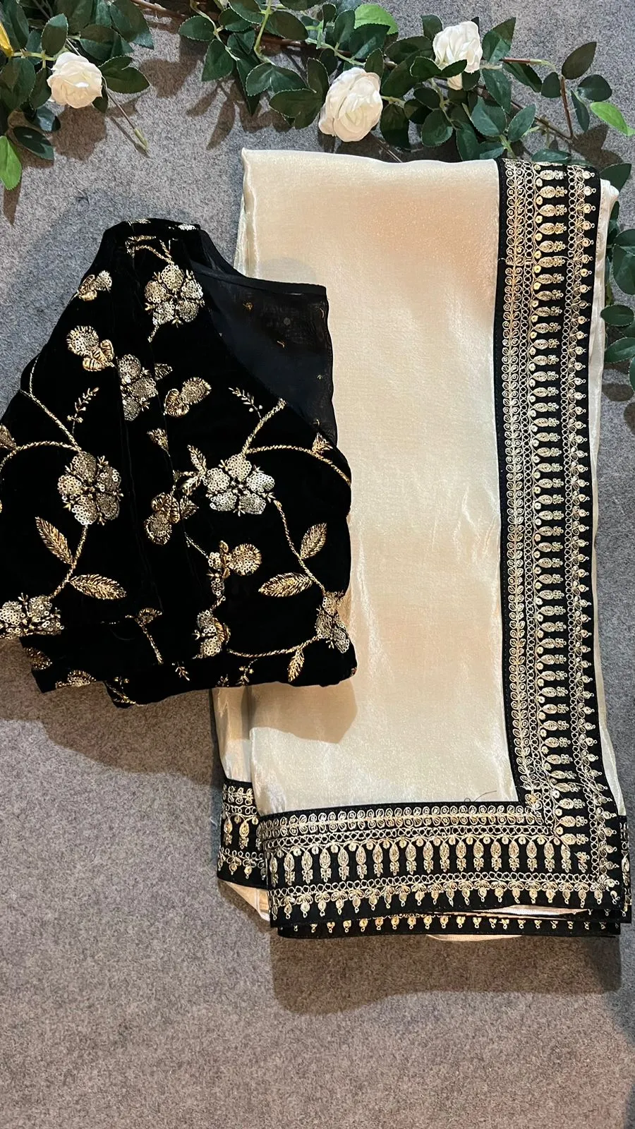 Golden silk saree with black hand work blouse