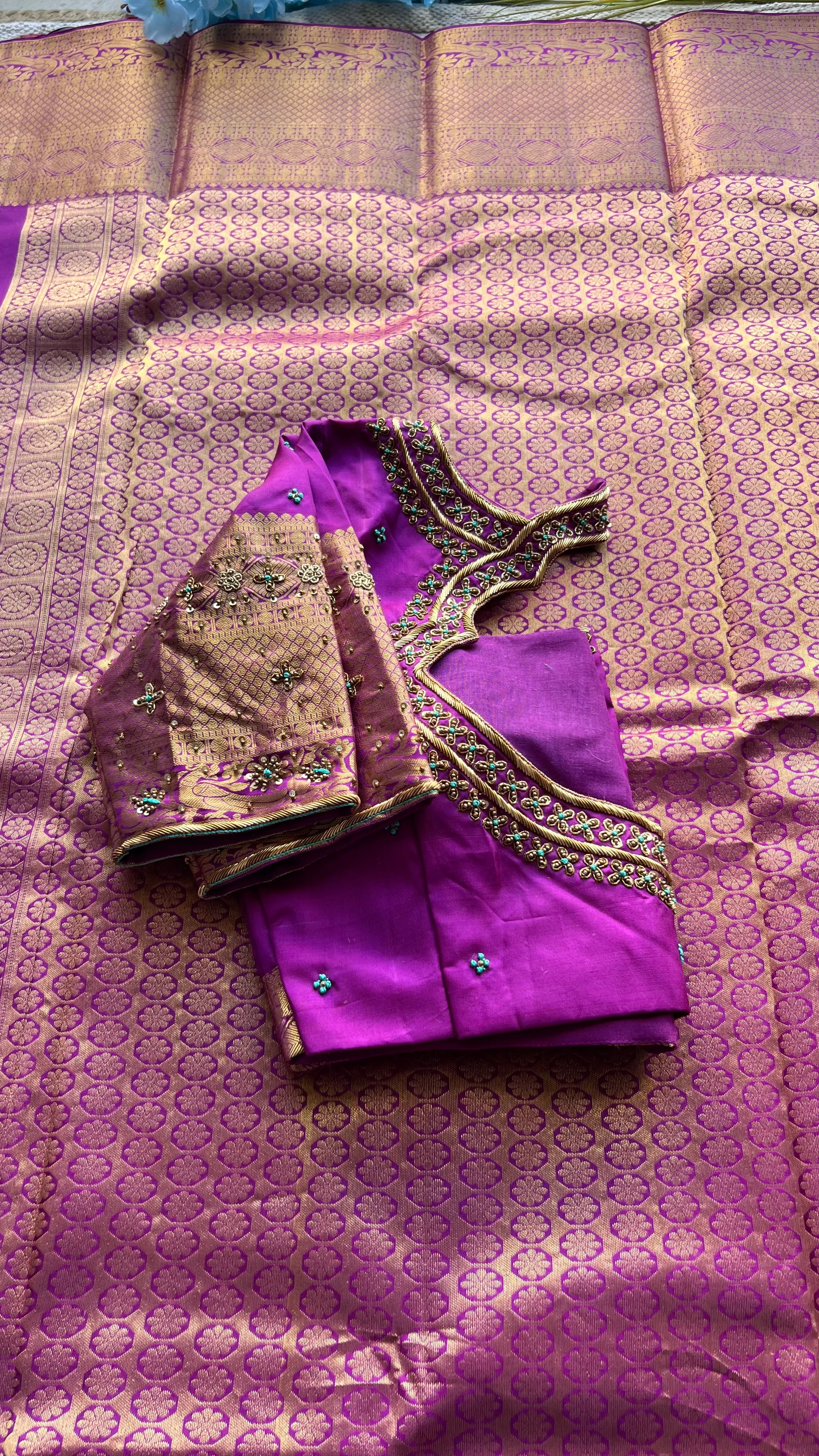 Sea blue and purple kanchipuram silk saree with hand worked blouse