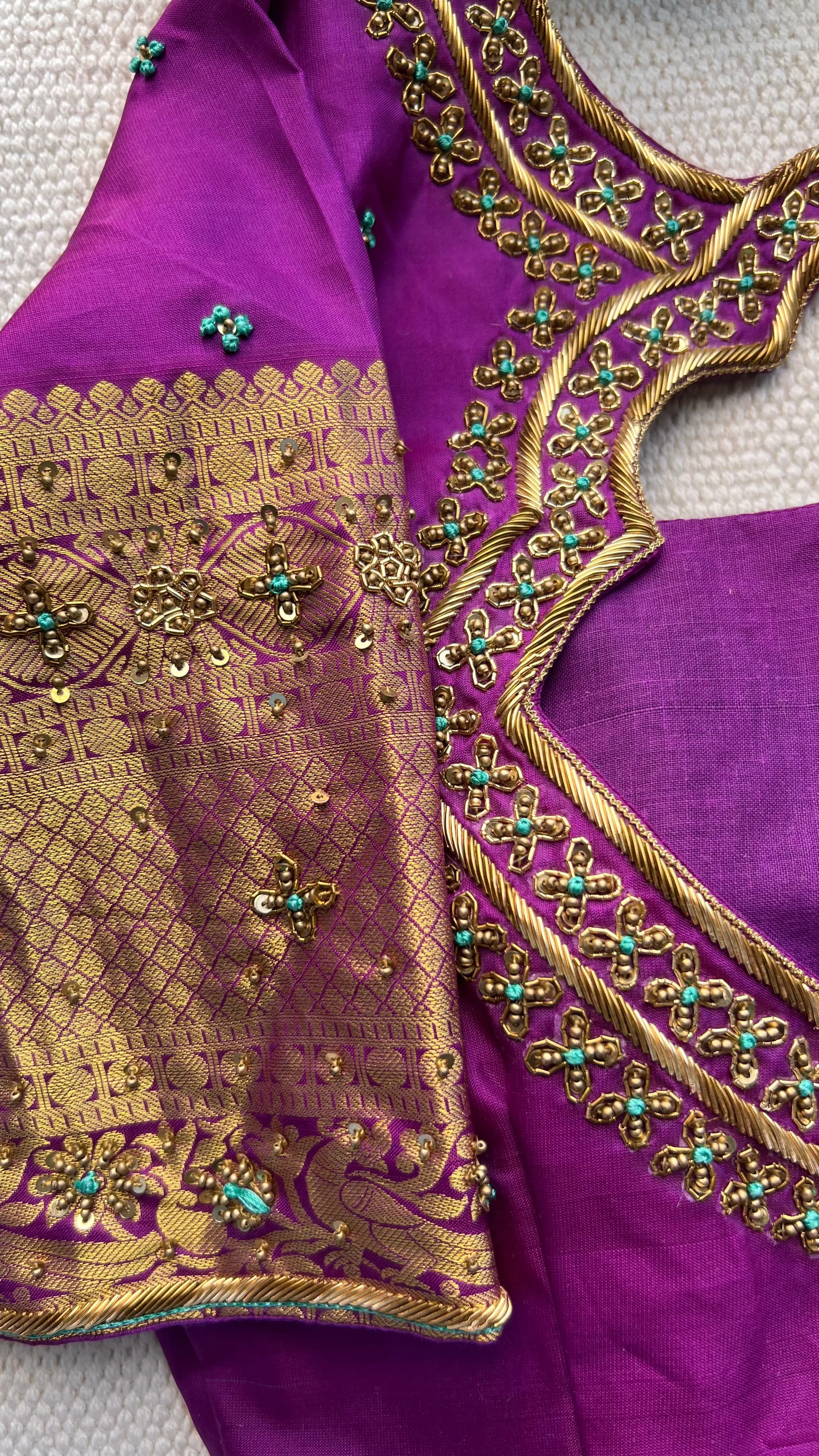 Sea blue and purple kanchipuram silk saree with hand worked blouse