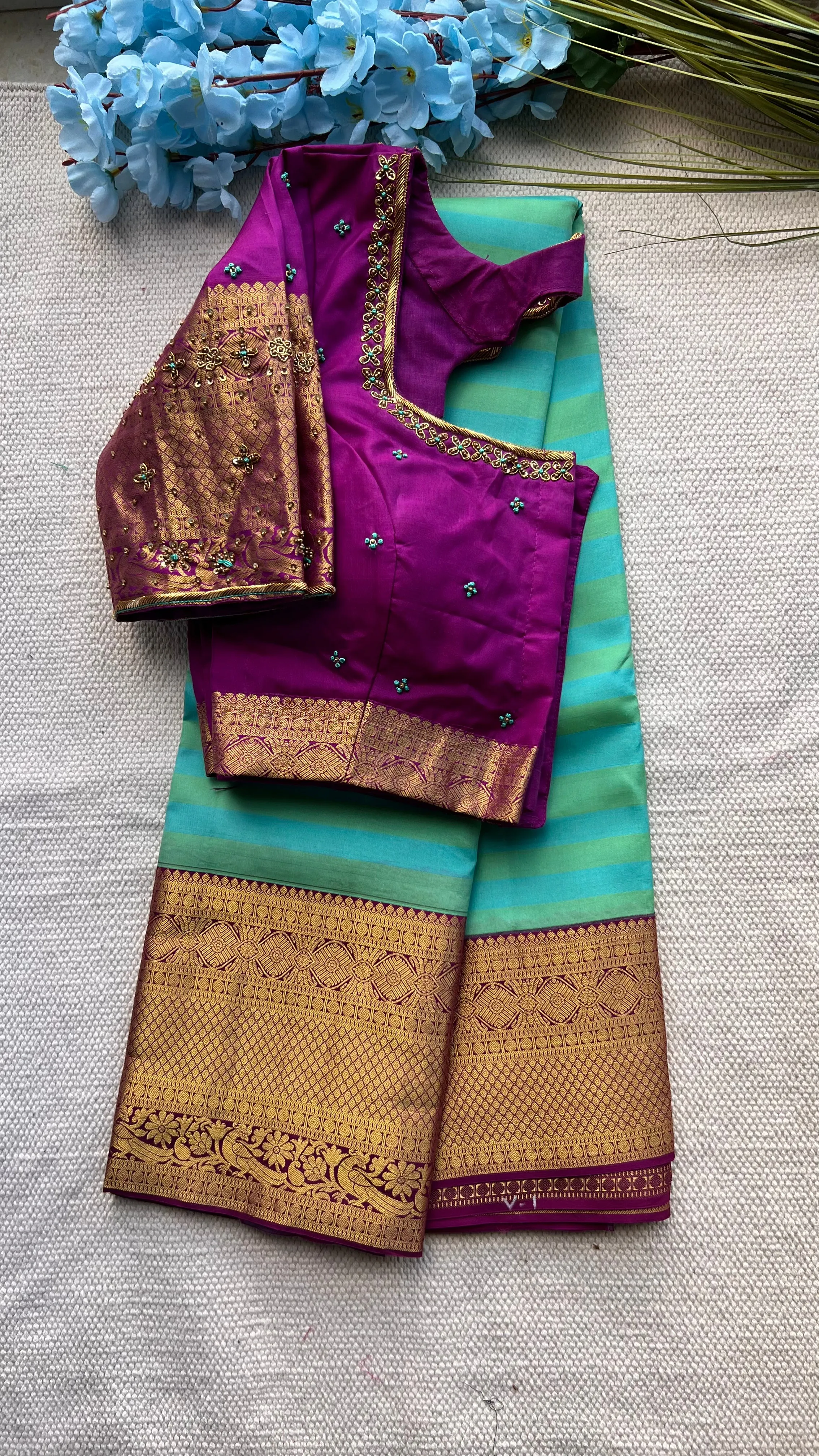 Sea blue and purple kanchipuram silk saree with hand worked blouse