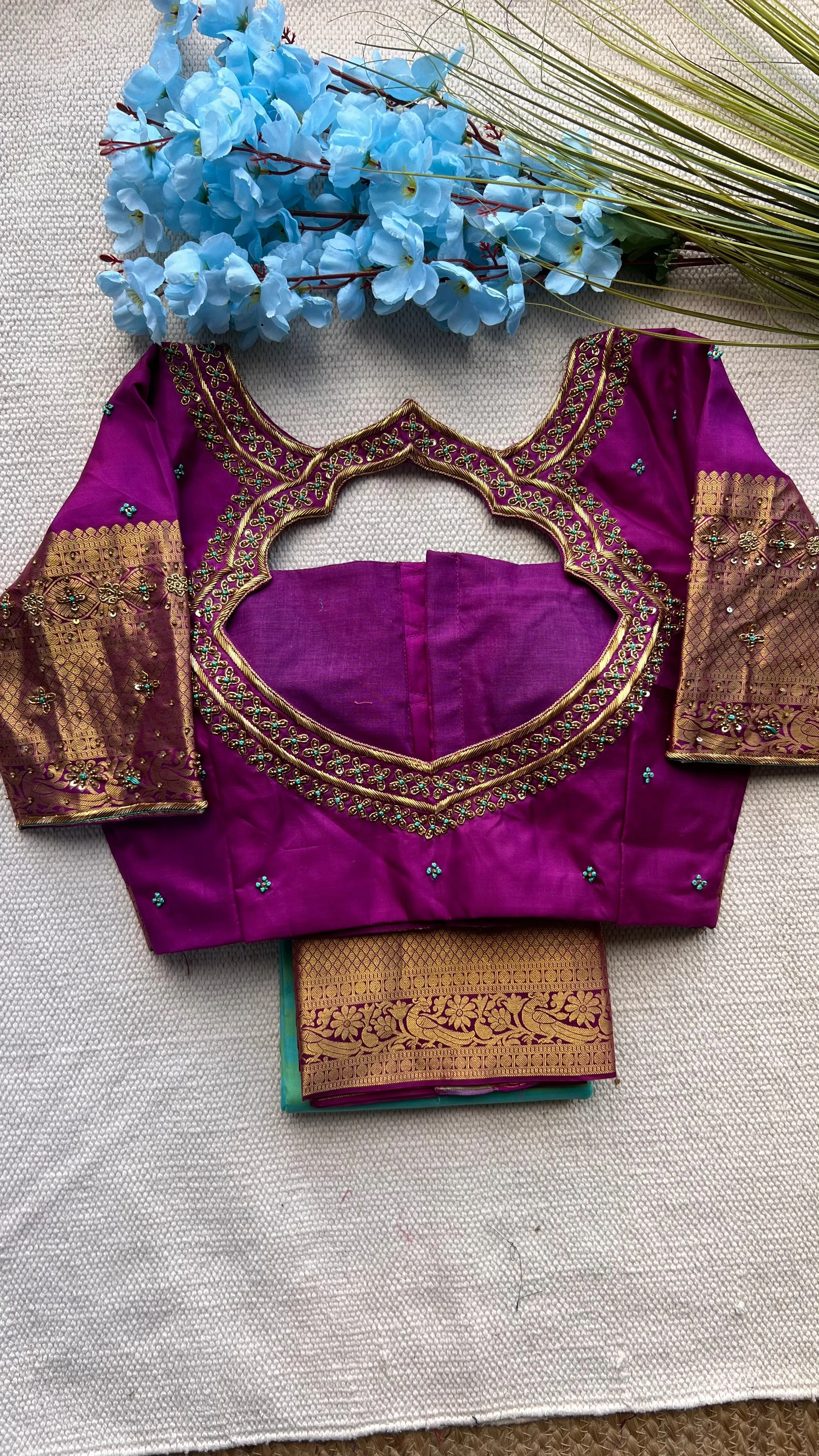 Sea blue and purple kanchipuram silk saree with hand worked blouse