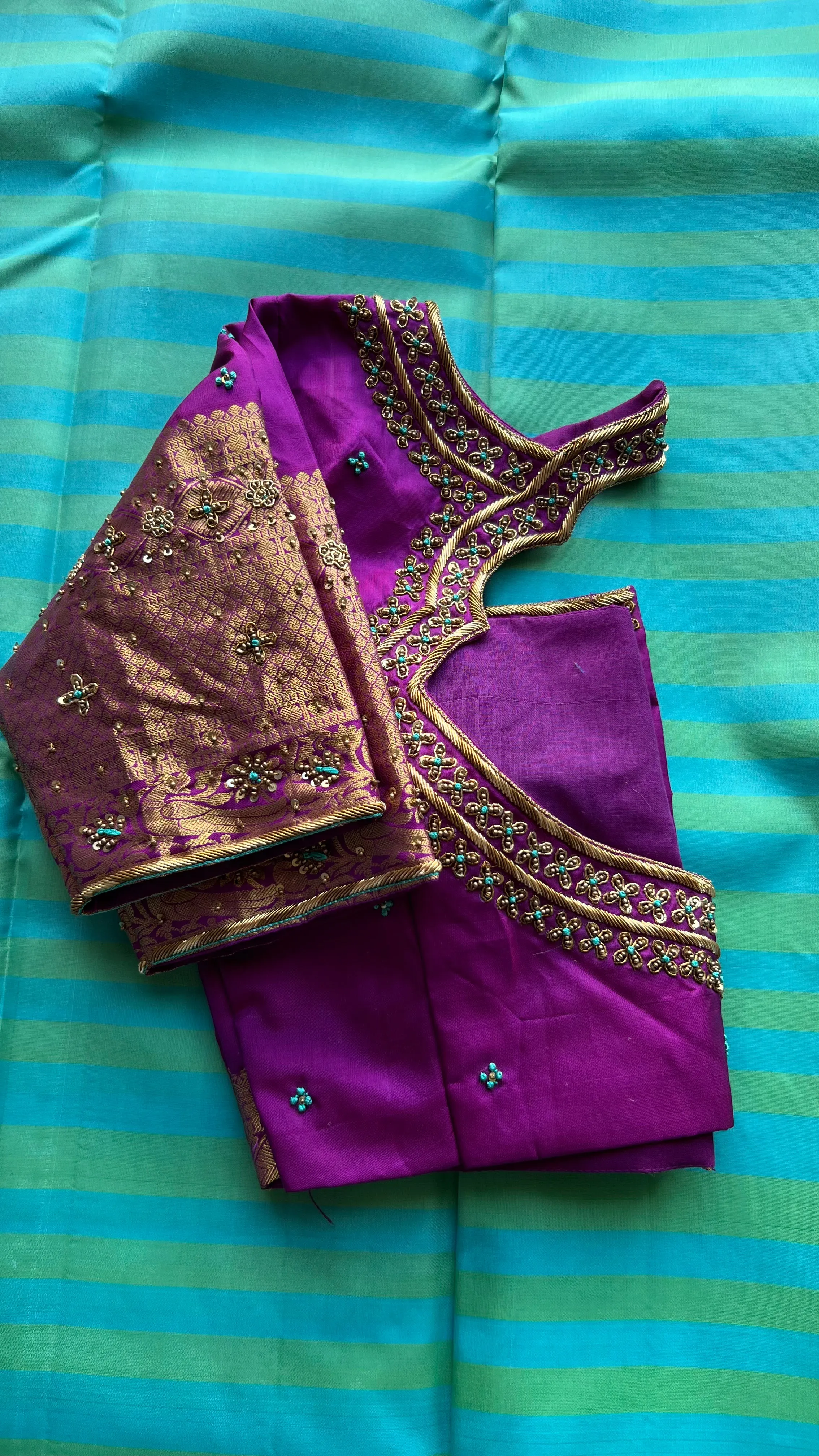 Sea blue and purple kanchipuram silk saree with hand worked blouse